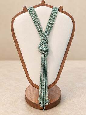 Charming Charlie teal and gold tone seed bead knotted necklace